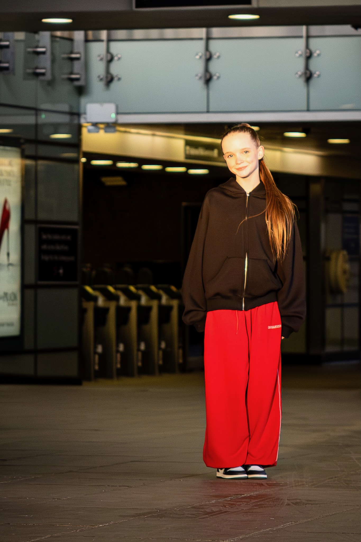 Dancer outside London station, urban editorial
